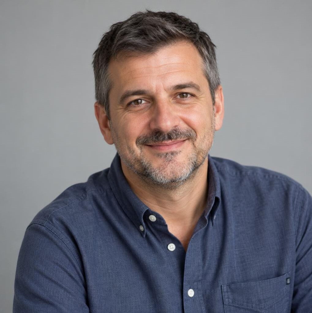 Portrait of a smiling man in a casual shirt